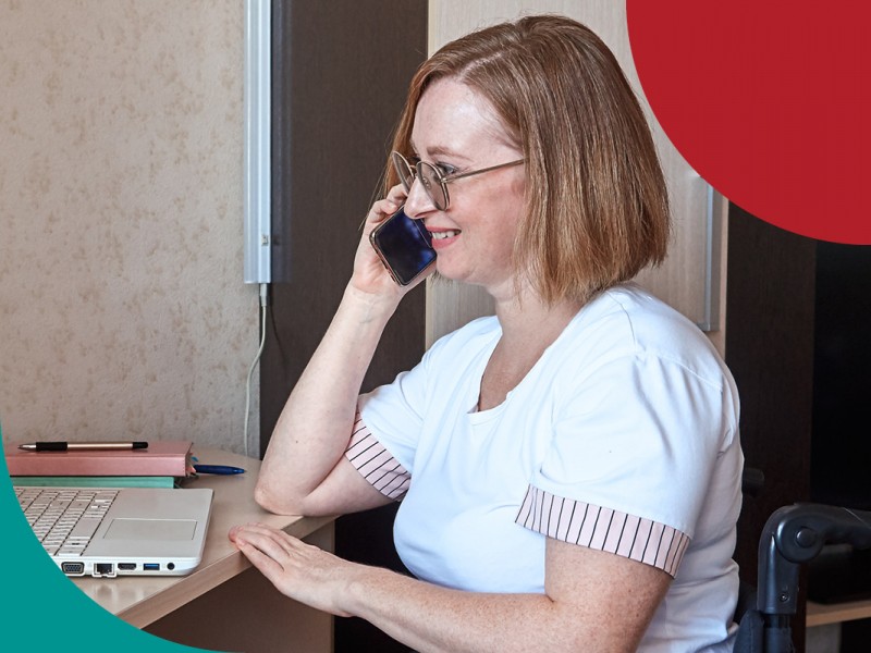 girl smiling at desk